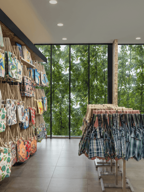 Lady J fabric accessories displayed beside large windows
